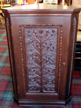 Thistle Carved Corner Cabinet (Skibo Interest)