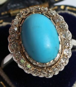 Early 20th cent Oval Cabochon Turquoise Ring, surrounded by Cushion Shaped Diamonds - SOLD